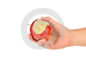 Hand holds red bitten apple