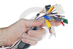 Hand holds set of cables with connectors