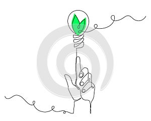 Hand holds slight bulb with leafs,one line art,hand drawn continuous contour.Green energy idea concept.Sign of environmental