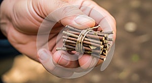 A hand holds a small bundle