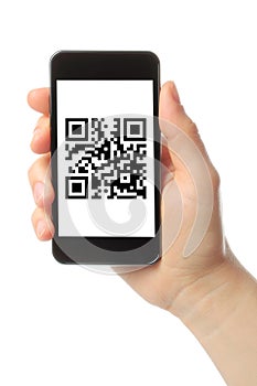 Hand holds smart phone with QR code