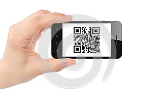 Hand holds smart phone with QR code