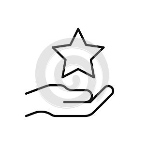 Hand holds star on palm