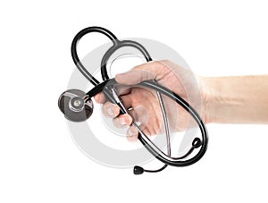 The hand holds a stethoscope. Close up. Isolated on a white background