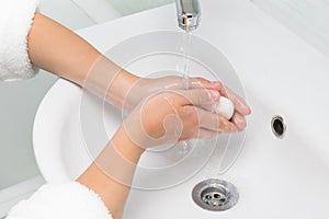 Hand hygiene in the bathroom, top view, close-up