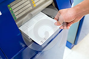 Hand inserting bankbook