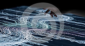 Hand Interacting with Data Visualization on Screen, Exploring Complex Information