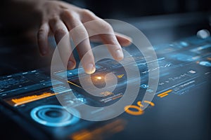 Hand interacting with a futuristic digital touchscreen interface displaying data and charts