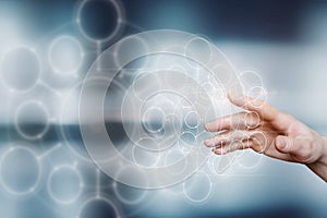 A hand interacts with a digital interface