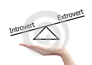 hand with introvert and extrovert concept