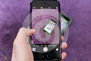 Hand and Iphone 6 plus