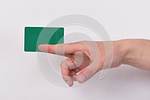 Hand isolated on light grey background. Advertising and introducing concept.