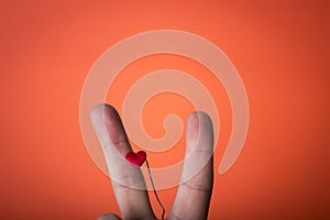 hand isolated on orange red background