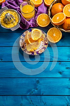 Hand juicer and fresh oranges.Tropical fresh fruits