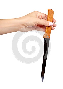 Hand with kitchen knife, home utensil, wooden handle