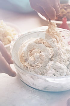 Hand knead the dough into dumplings