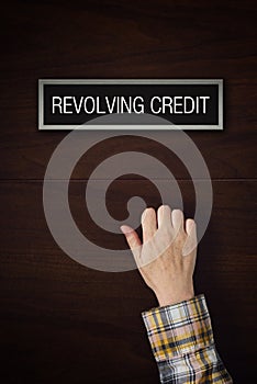 Hand is knocking on Revolving Credit door