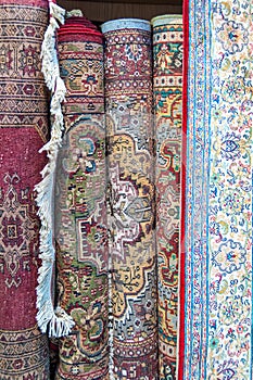 Hand knotted carpets on display for sale in Muttrah Souk, Muscat, Oman, Middle East