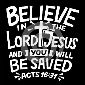 Hand lettering with Bible verse Believe in the Lord Jesus and you will be saved on black background.