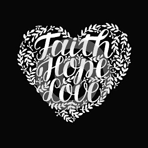 Hand lettering with bible verse Faith, hope and love in shape of heart on black background.