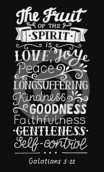 Hand lettering with bible verse The fruit of the Spirit on black background. Galatians