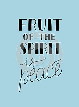 Hand lettering with bible verse The fruit of the spirit is peace on blue background. photo