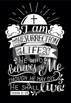 Hand lettering with bible verse I am the resurrection and life on black background. photo