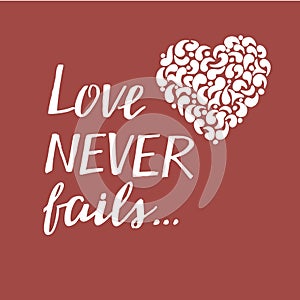 Hand lettering with bible verse Love never fails with heart. made on red background. photo