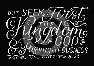 Hand lettering with bible verse But seek first the Kingdom of God and His righteousness on black background photo