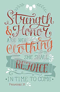 Hand lettering with bible verse Strength and honor are her clothing, she shall rejoice in time to come with flowers. photo