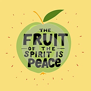 Hand lettering The fruit of the spirit is peace made on the apple. photo