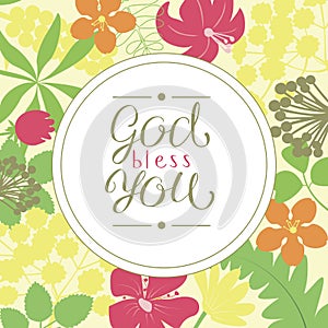 Hand lettering God bless you, is made on a floral background.