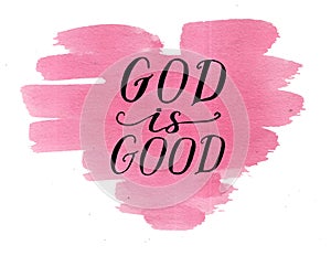 Hand lettering God is good on watercolor heart.