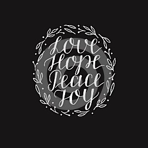 Hand lettering with inspirational holiday quotes Love, hope, peace, joy on black background.