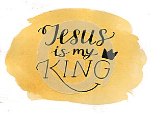 Hand lettering Jesus is my King on watercolor background.