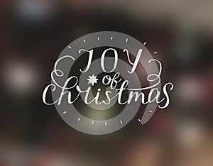 Hand lettering Joy of christmas with star.