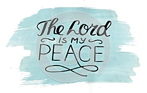 Hand lettering The Lord is my peace, made on watercolor background.