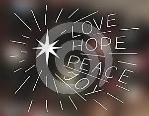 Hand lettering Love, hope, peace, joy with star.