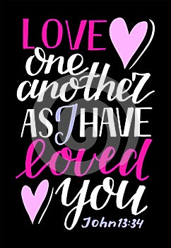 Hand lettering Love one another, as I have loved you on black background.