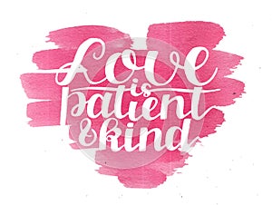 Hand lettering Love is patient and kind on watercolor pink heart