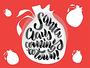 Hand lettering `Santa Claus is coming to town`