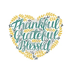 Hand lettering Thankful, grateful, blessed in shape of heart with leaves