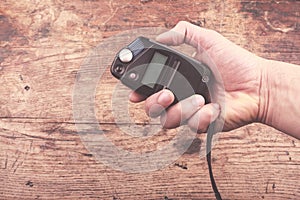 Hand with light meter