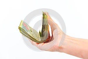 hand a lot of money, white background, finance concept, spending on shopping