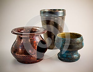 Hand-made ancient ceramic oil burner and cups