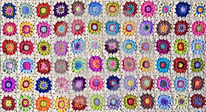 Patterned flower crochet blanket, background. photo