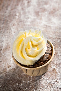 Hand-made cake on wood background