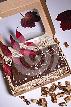 Hand made chocolate with fruit pieces, packed