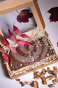 Hand made chocolate with fruit pieces, packed