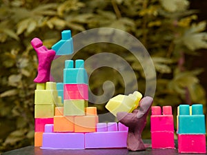 hand made clay art toy character creating block house together